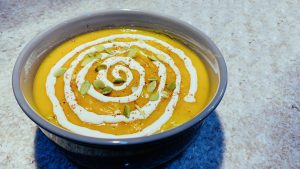 Kabocha Squash Soup with Orange Cream and Pepitas